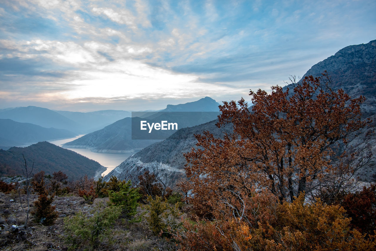 Scenic view of mountains against sky during autumn