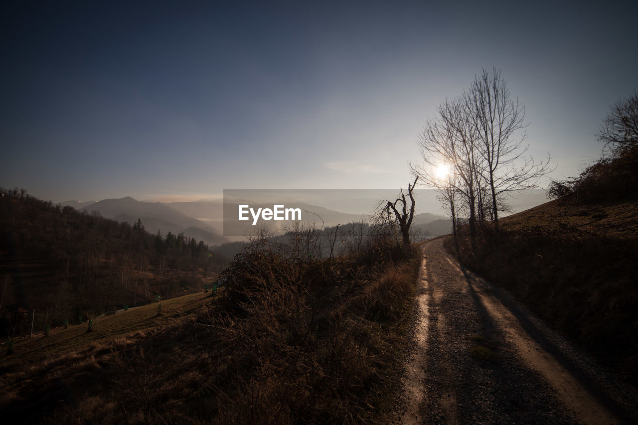 Scenic view of landscape against sky during sunset