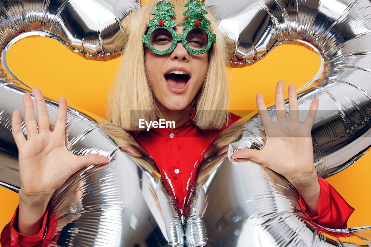 low angle view of woman wearing sunglasses