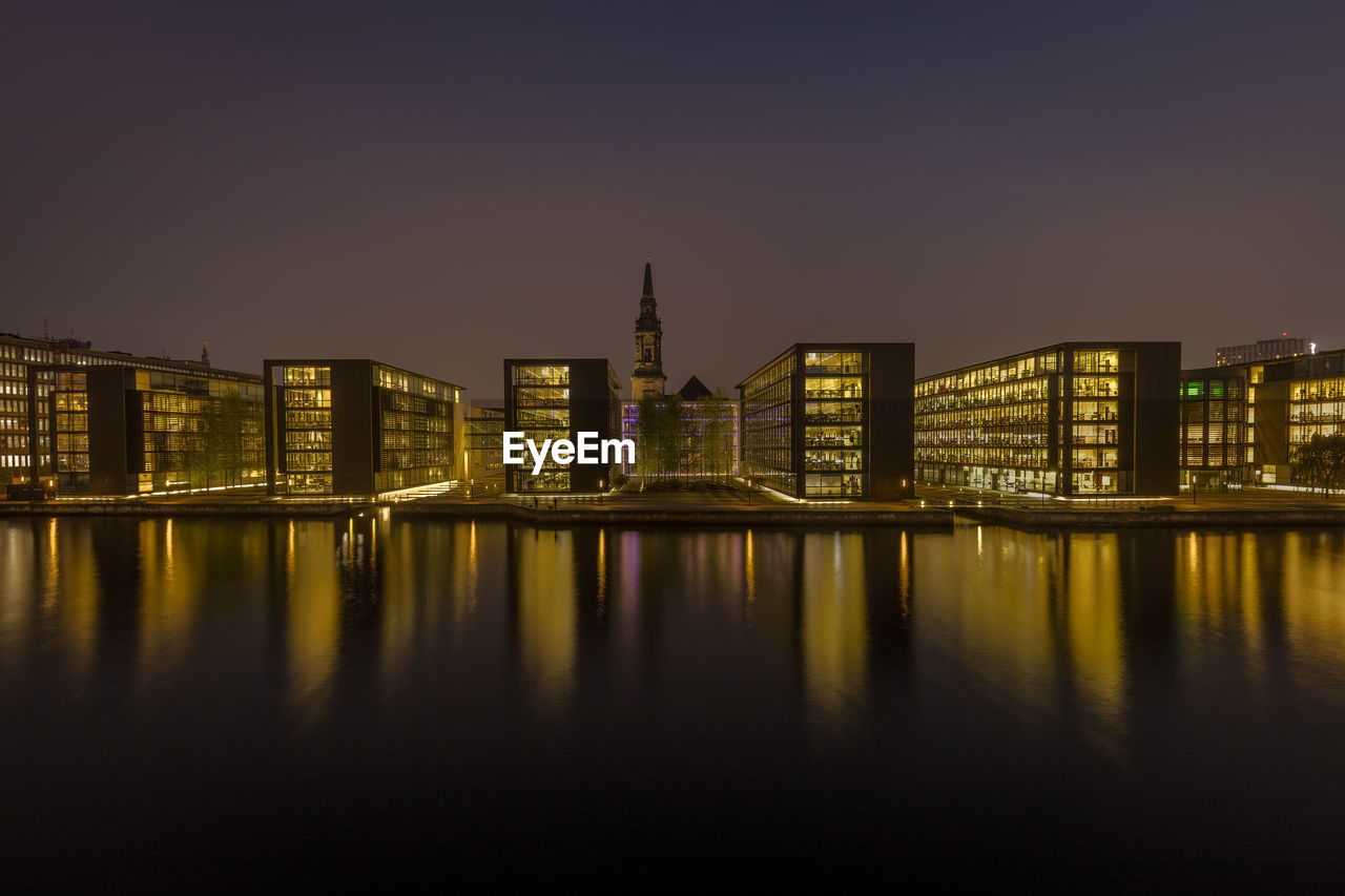 Office buildings in copenhagen with a church behind