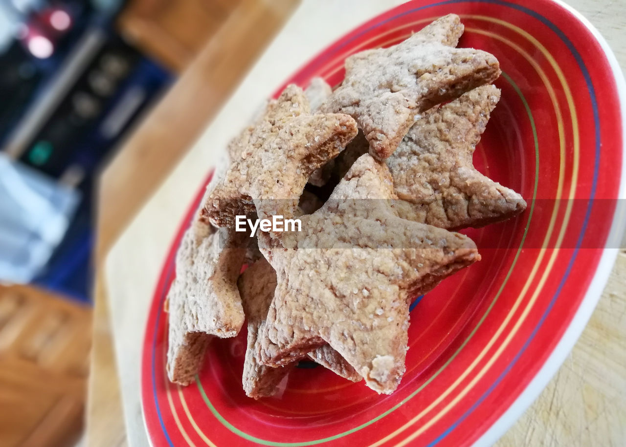 High angle view of cookies in plate on table