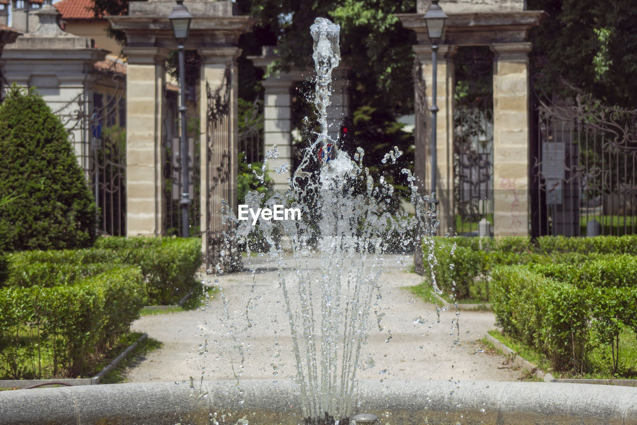 FOUNTAIN IN FRONT OF BUILDING