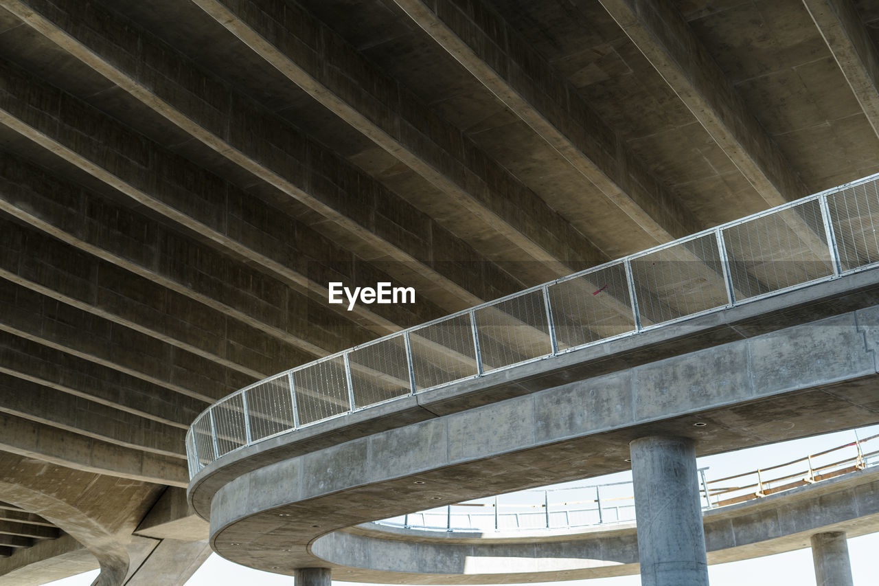 architecture, built structure, daylighting, no people, city, low angle view, bridge, transportation, architectural column, curve, line, day, wood, indoors, futuristic, concrete