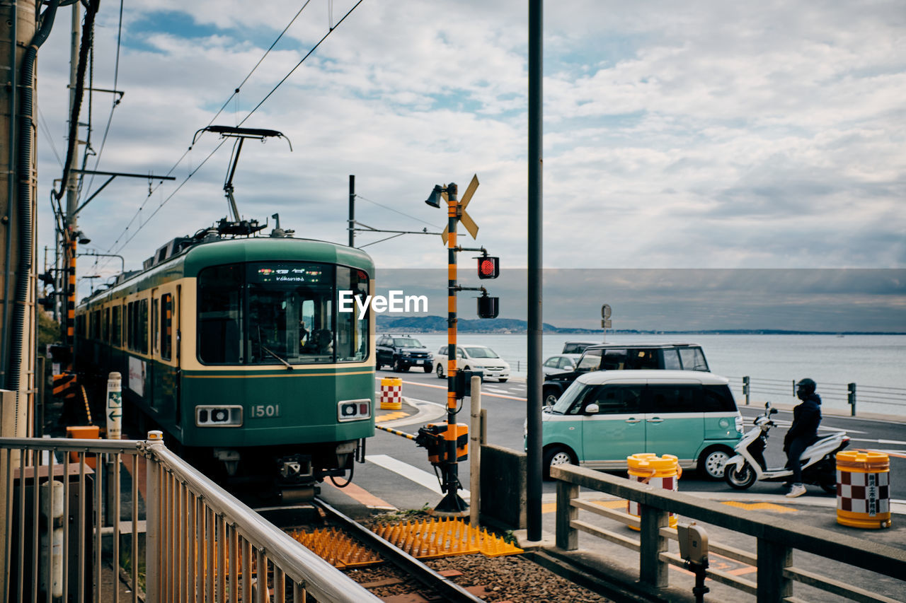 TRAIN BY SEA AGAINST SKY