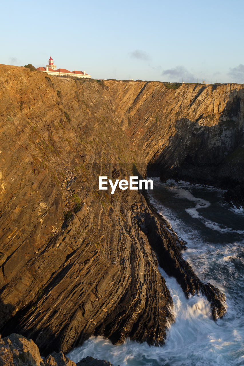 Scenic view of rock formations against sky