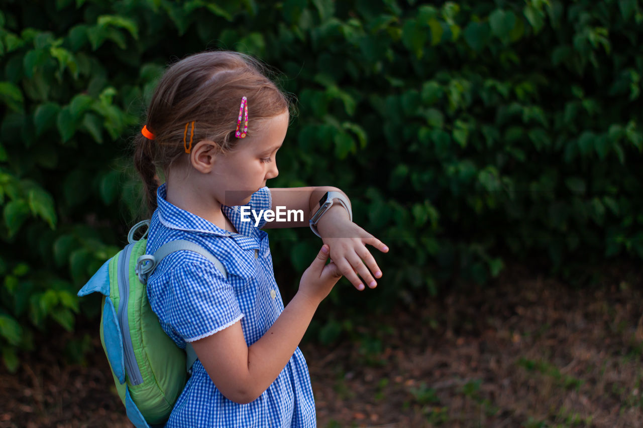 Side view of girl looking away