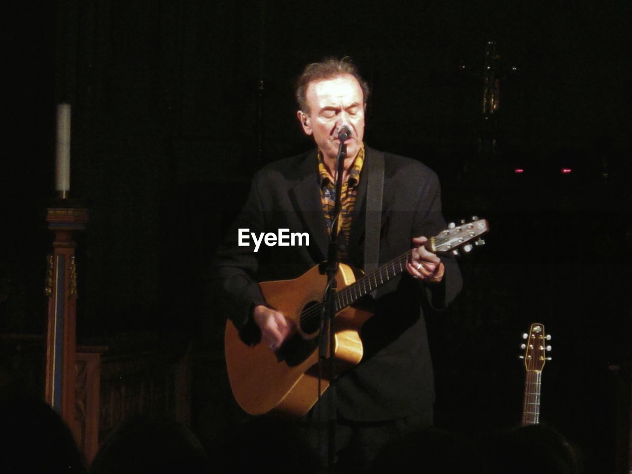 Musician performing on stage