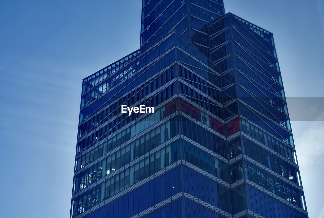 Low angle view of modern buildings against clear sky