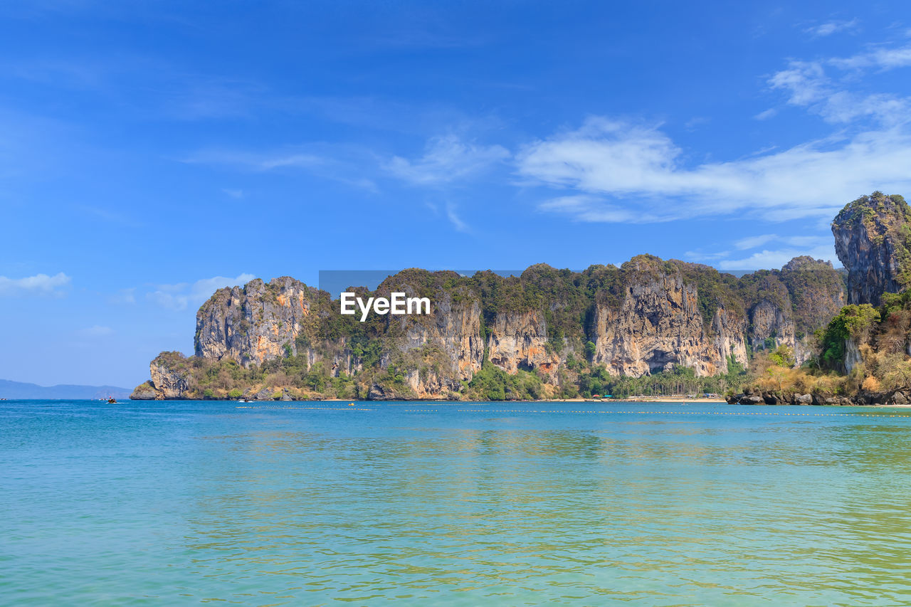 Scenic view of sea against blue sky