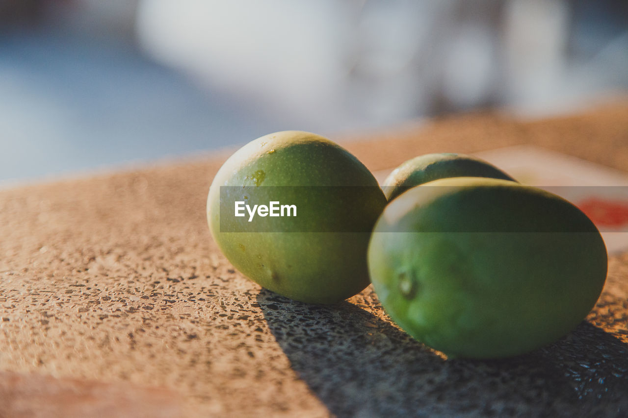 Close-up of apples on table