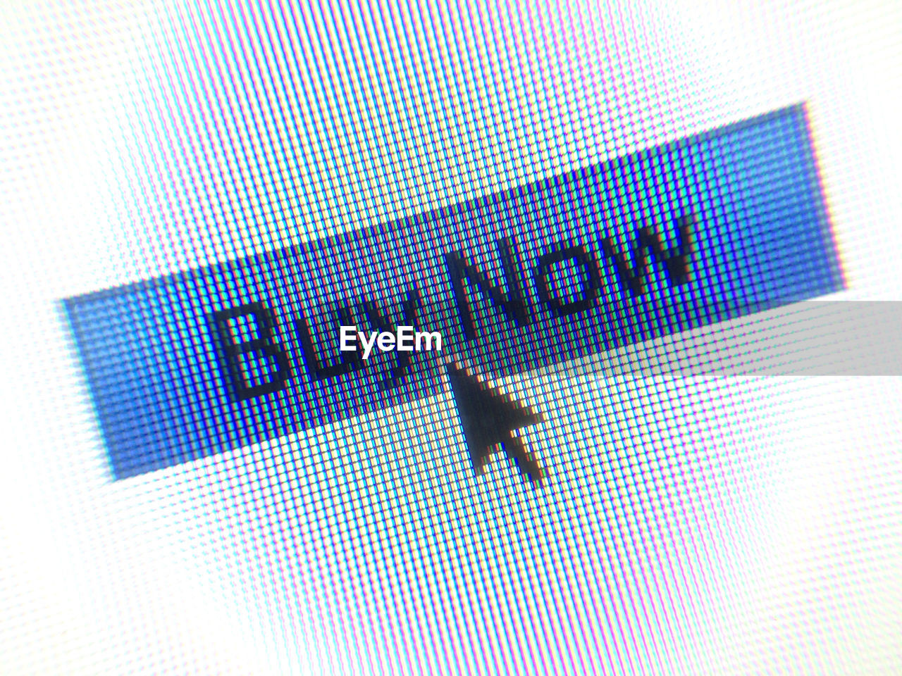 Close-up of buy now button on computer screen