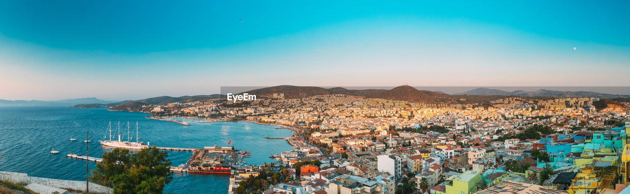 high angle view of townscape against blue sky