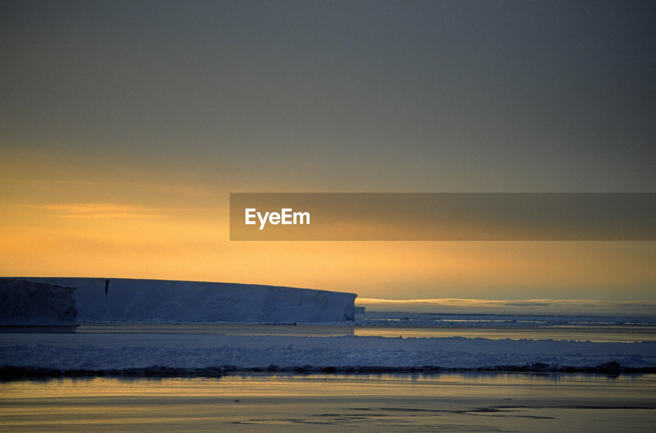 Iceberg at sunset