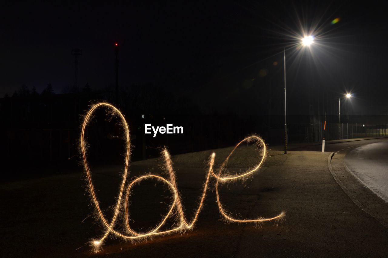 HEART SHAPE MADE FROM ILLUMINATED STREET LIGHT