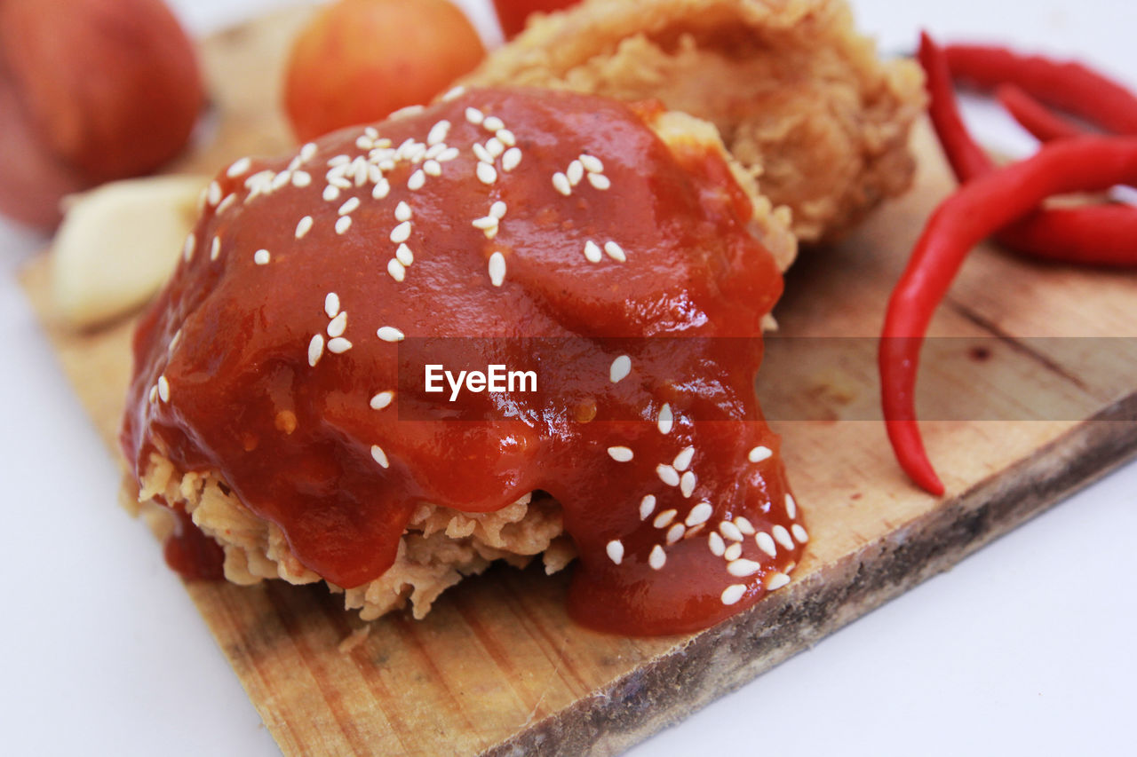 Close-up of spicy sauce fried chicken