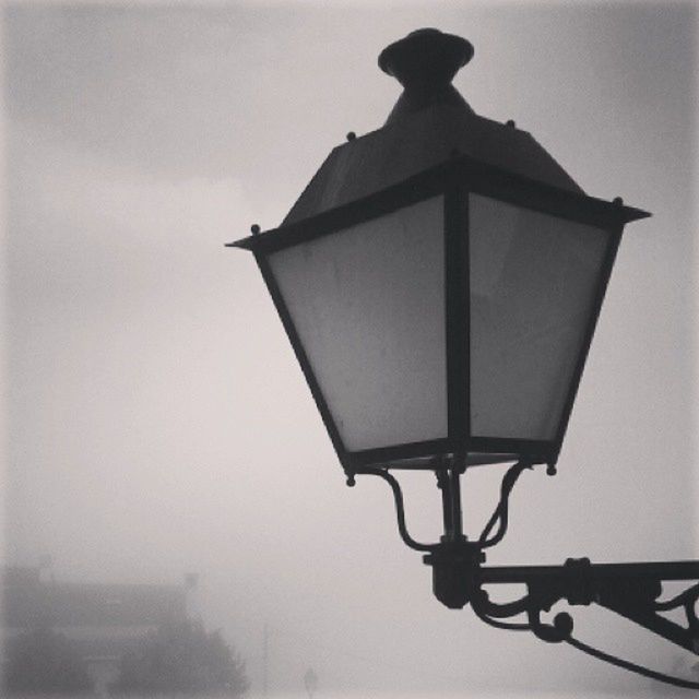 LOW ANGLE VIEW OF LAMP POST AGAINST SKY