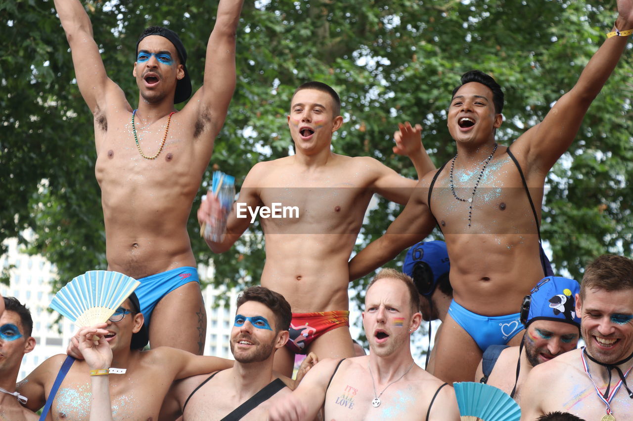 GROUP OF PEOPLE IN BIKINI