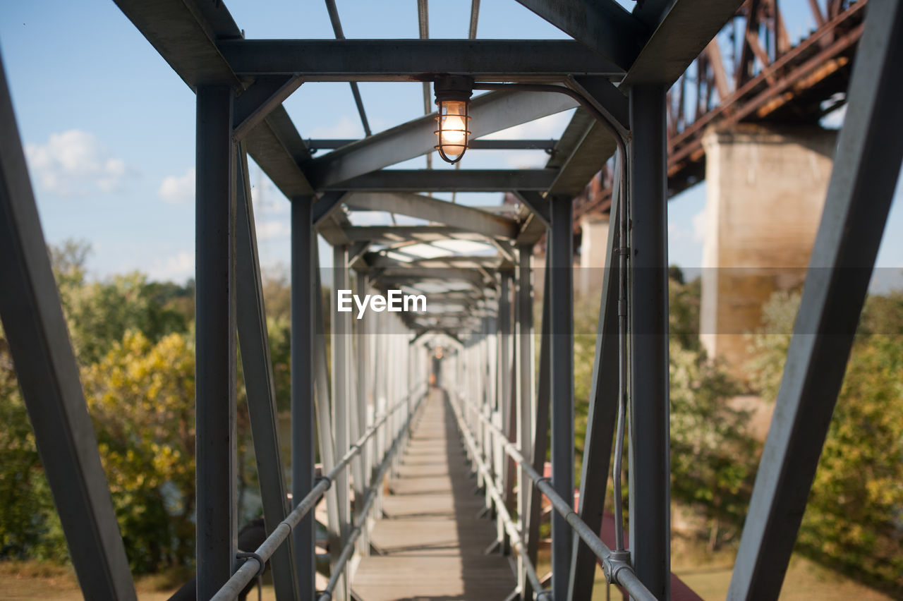 Empty illuminated footbridge