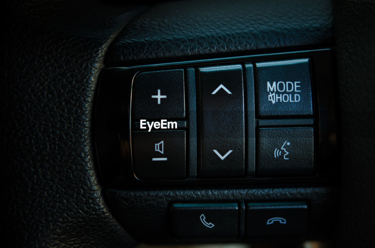 Close-up of push buttons in car