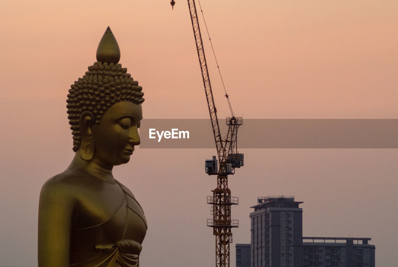 The giant golden buddha in wat paknam phasi charoen temple in phasi charoen district