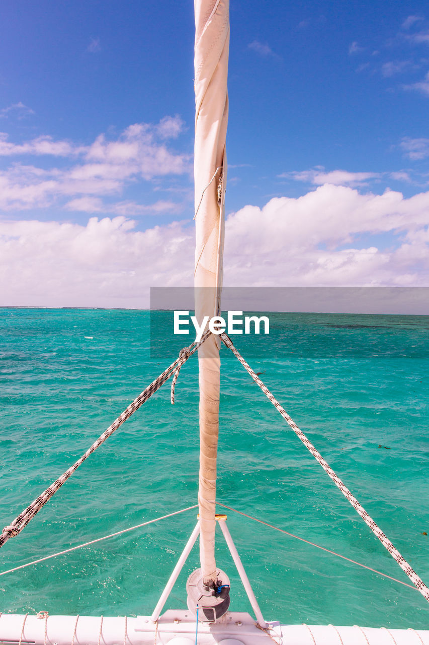 Low angle view of boat in sea against sky