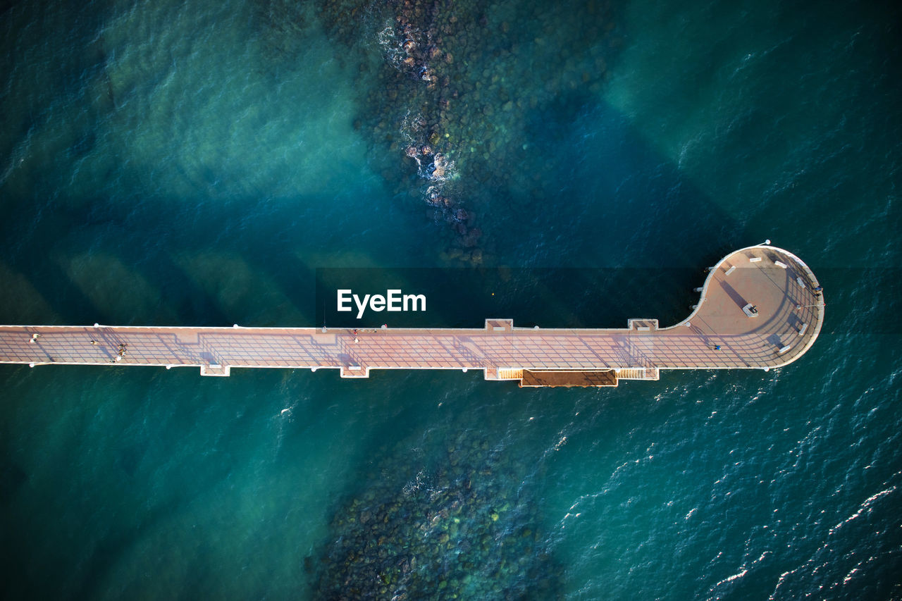 Aerial view of pier in sea