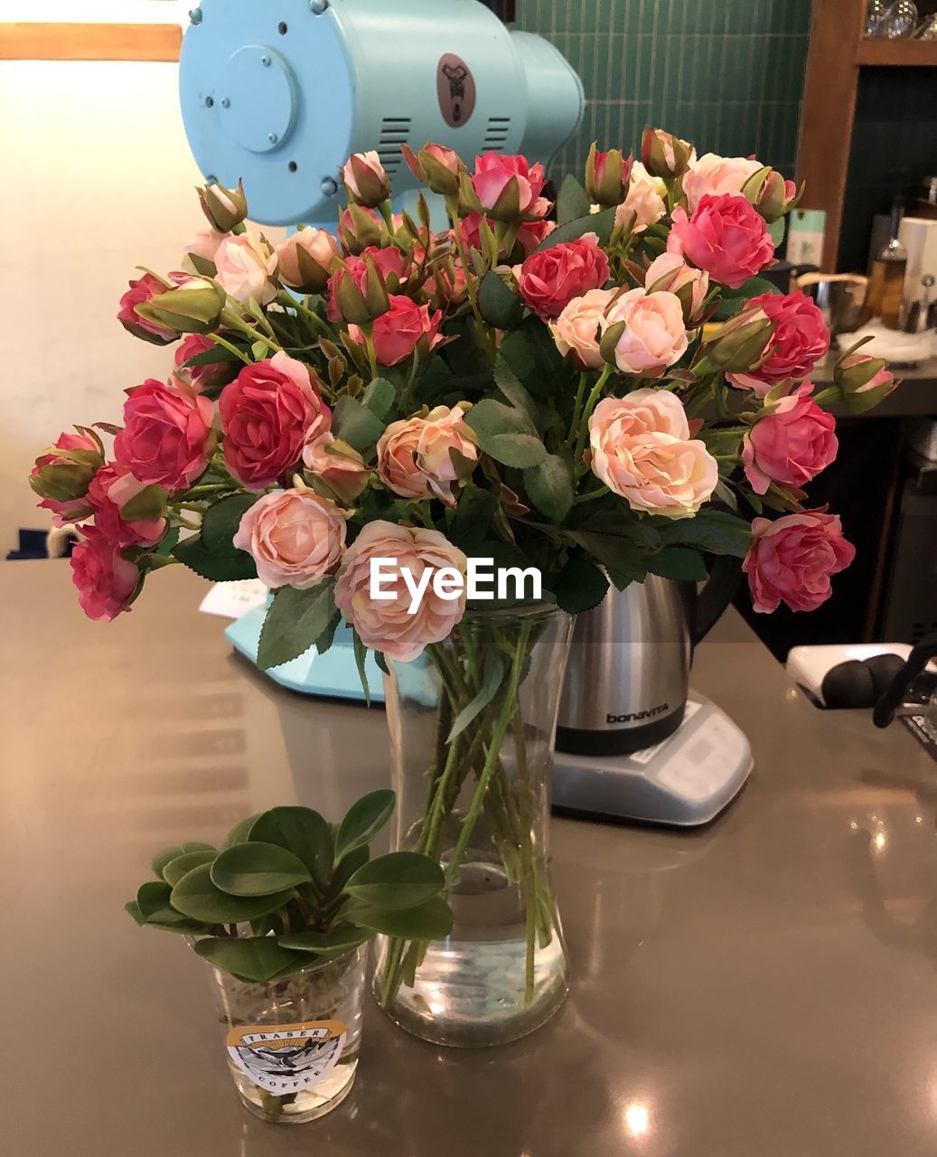 flower, plant, flowering plant, floristry, nature, pink, centrepiece, vase, flower arrangement, freshness, beauty in nature, indoors, floral design, bouquet, arrangement, table, no people, decoration, bunch of flowers, rose, flower head, fragility, art, business, still life, close-up