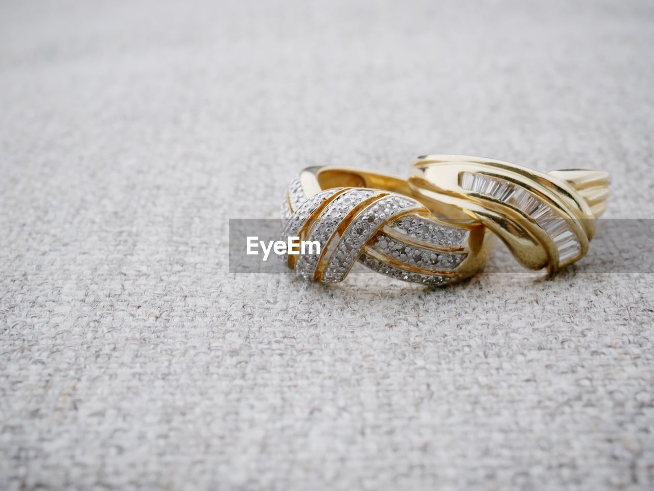 High angle view of wedding rings on table