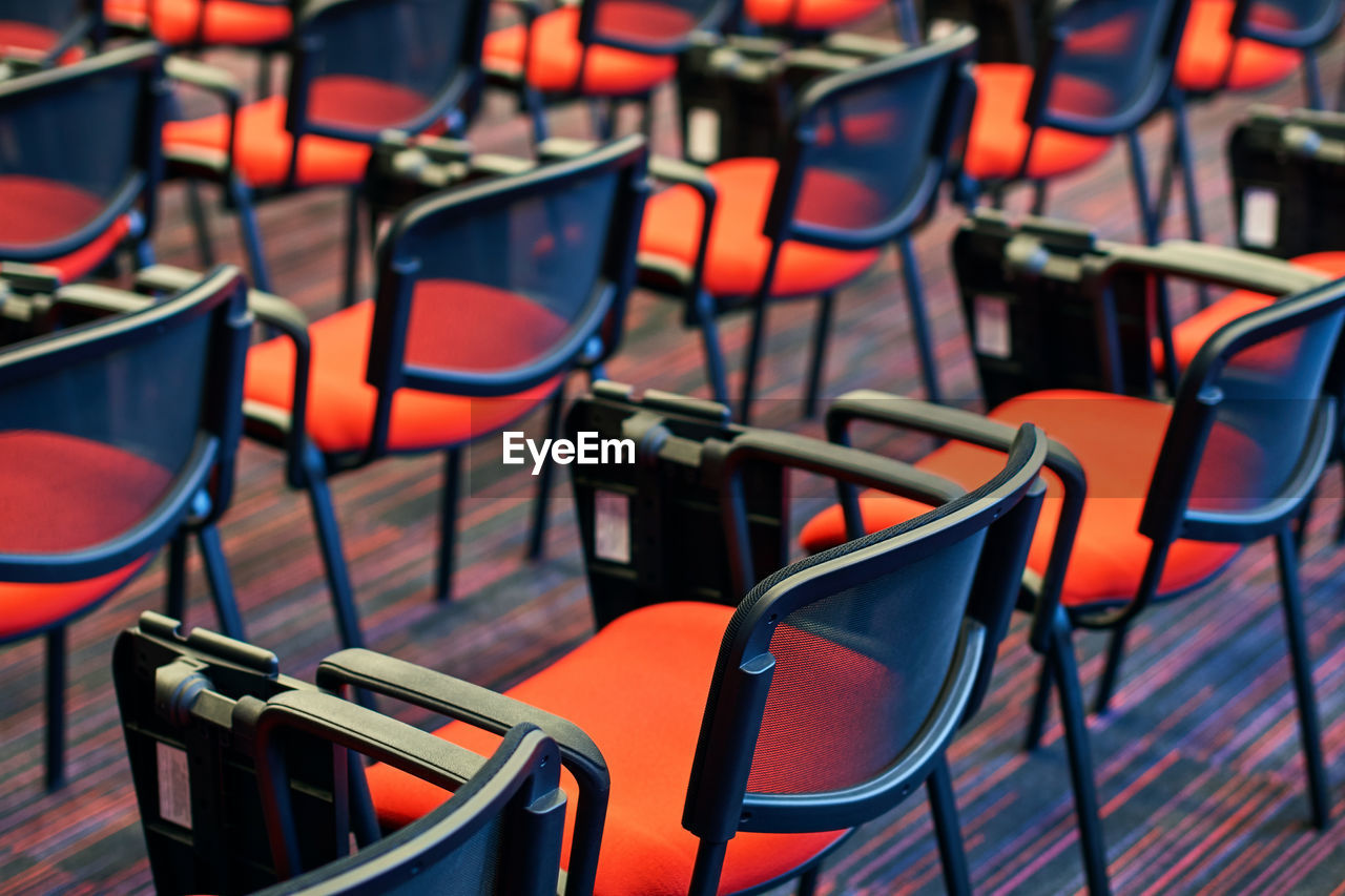 EMPTY CHAIRS AND TABLES IN STADIUM