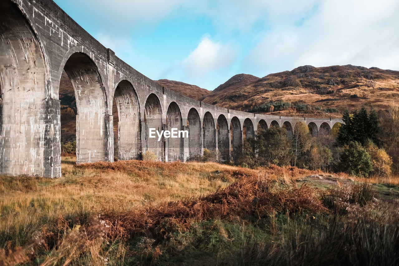 Glenfinnan viaduct bridge against sky