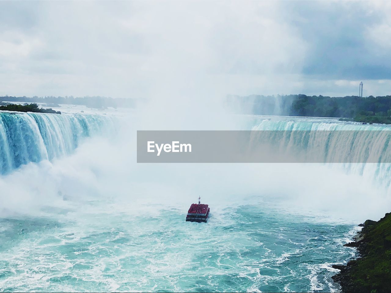 Scenic view of ferry boat sailing niagara falls 