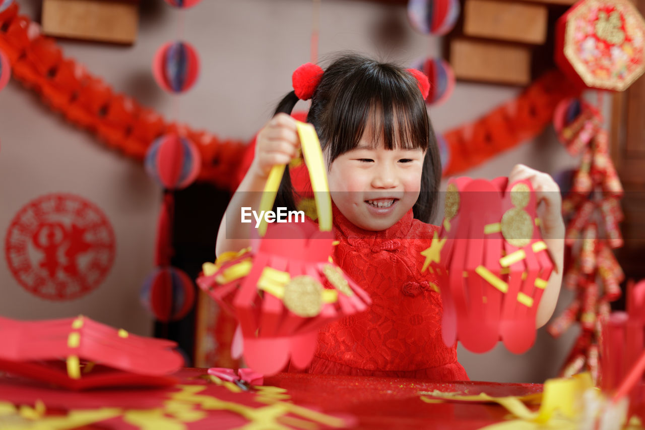 Young chinese girl with traditional dressing up celebrate chinese new year