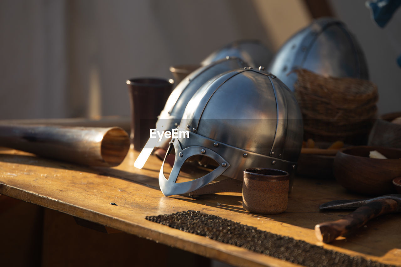 CLOSE-UP OF OLD FASHIONED AND TABLE