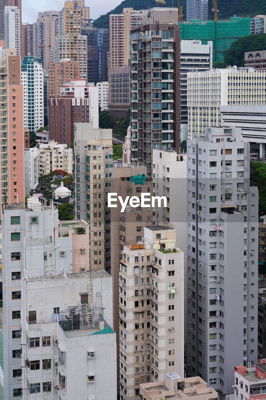 High angle view of buildings in city, hong kong 