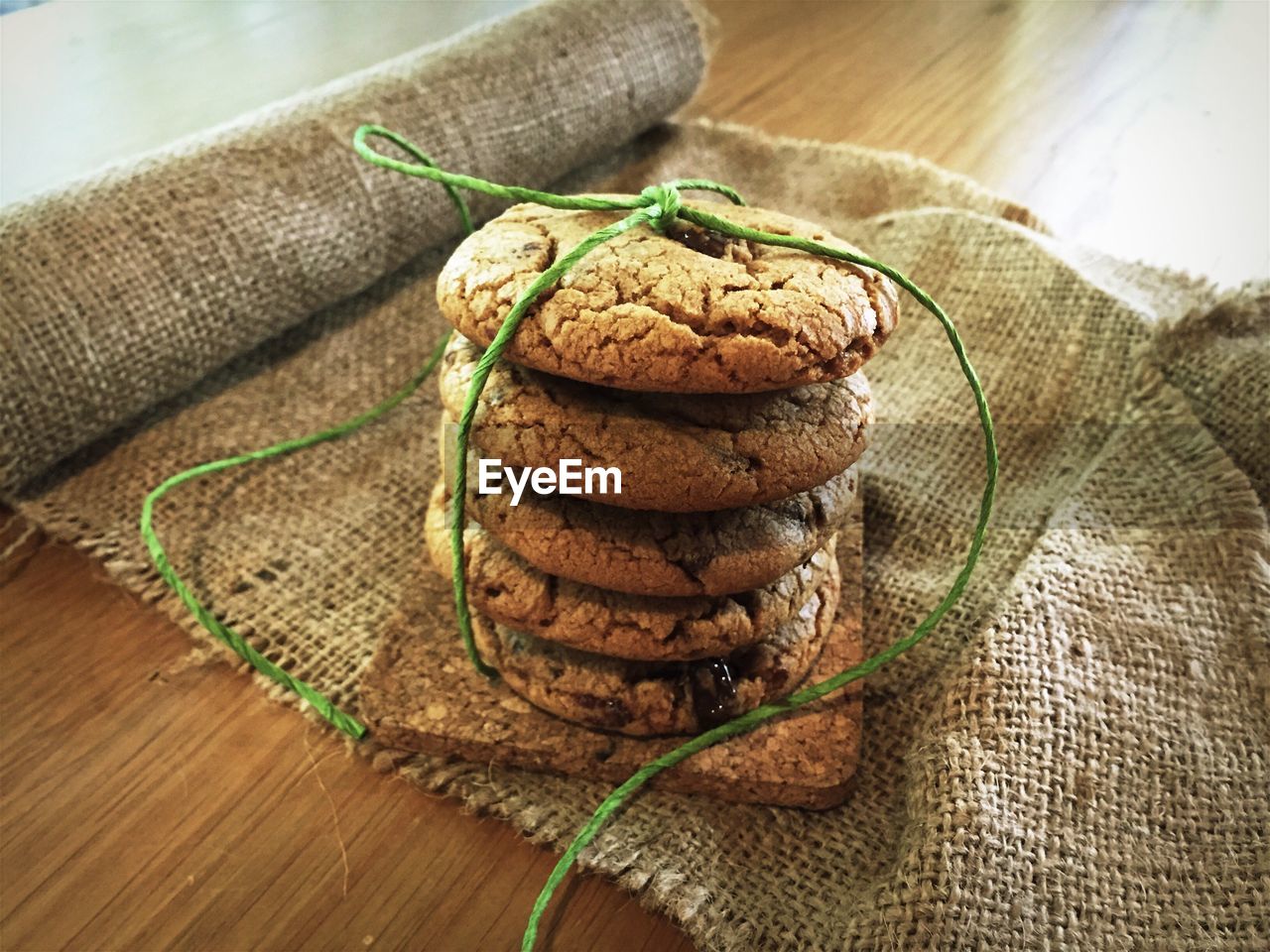 High angle view of cookies stacked on table