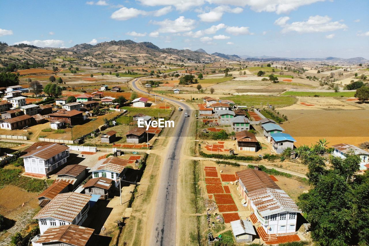 High angle view of buildings in city against sky