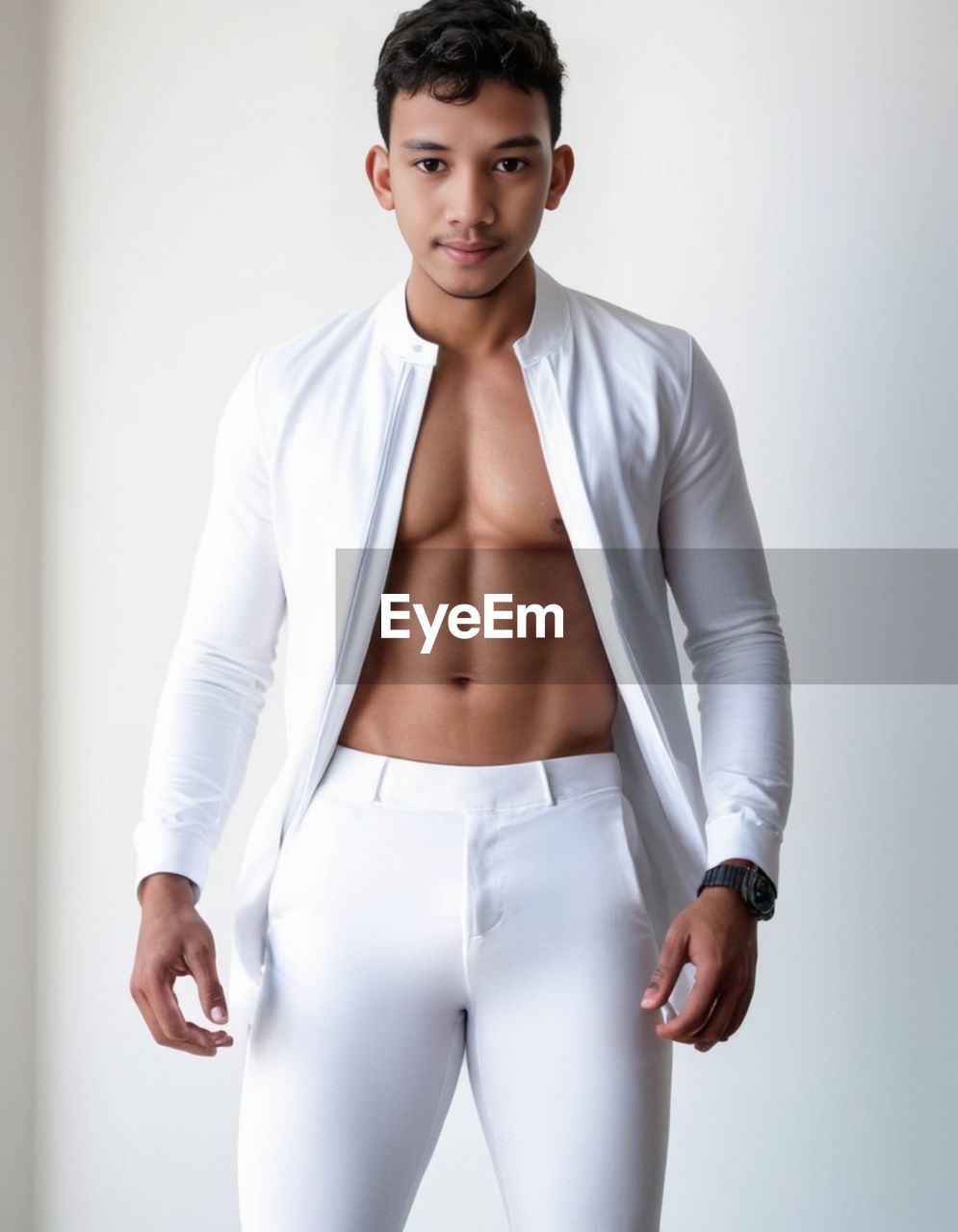 one person, clothing, portrait, young adult, adult, indoors, looking at camera, studio shot, standing, men, lifestyles, undergarment, front view, underpants, strength, exercising, muscular build, serious, photo shoot, three quarter length, sleeve, sports, athlete, person, relaxation, wellbeing, briefs, fashion, trousers, textile