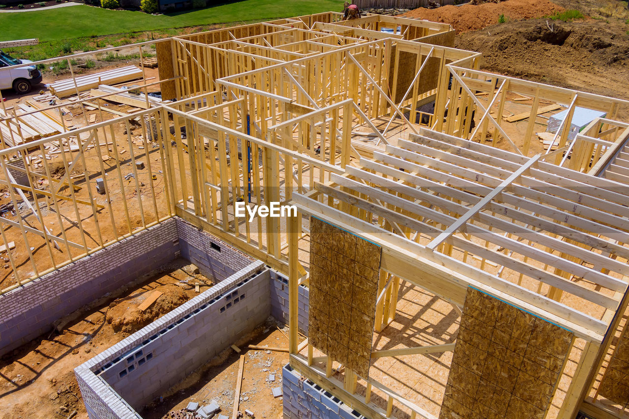 HIGH ANGLE VIEW OF CONSTRUCTION SITE ON LAND