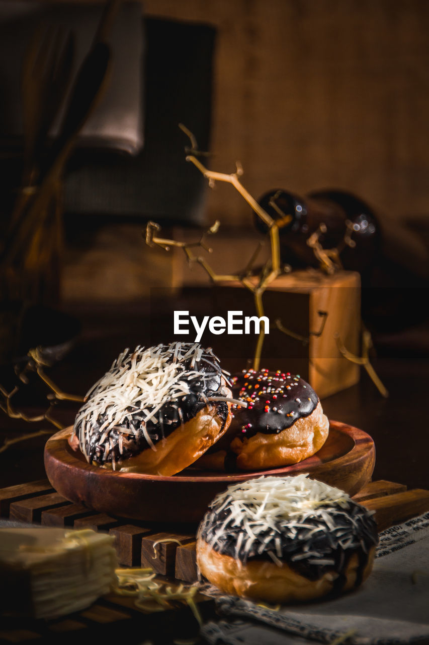 Close-up of donuts on table