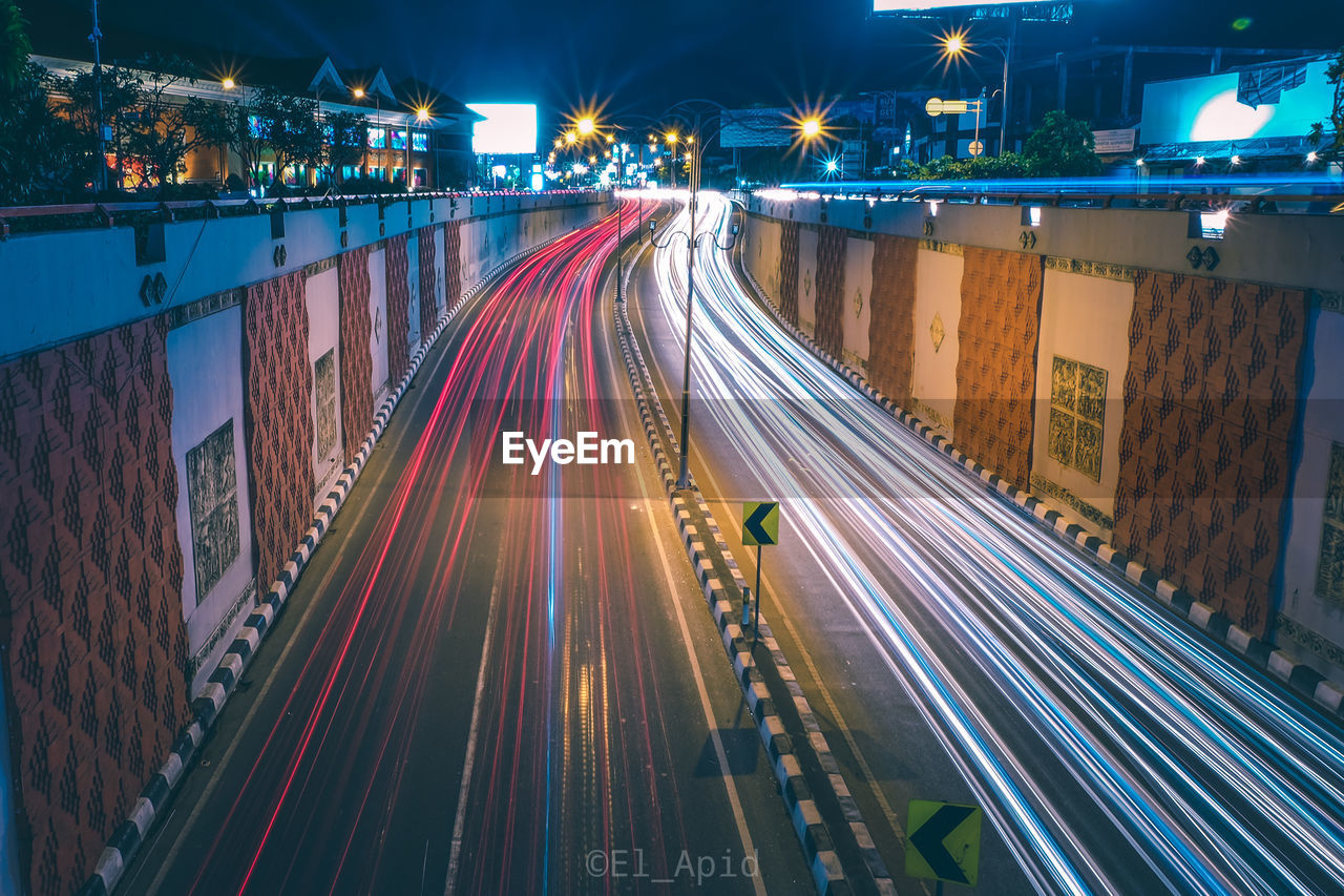 HIGH ANGLE VIEW OF LIGHT TRAILS ON STREET