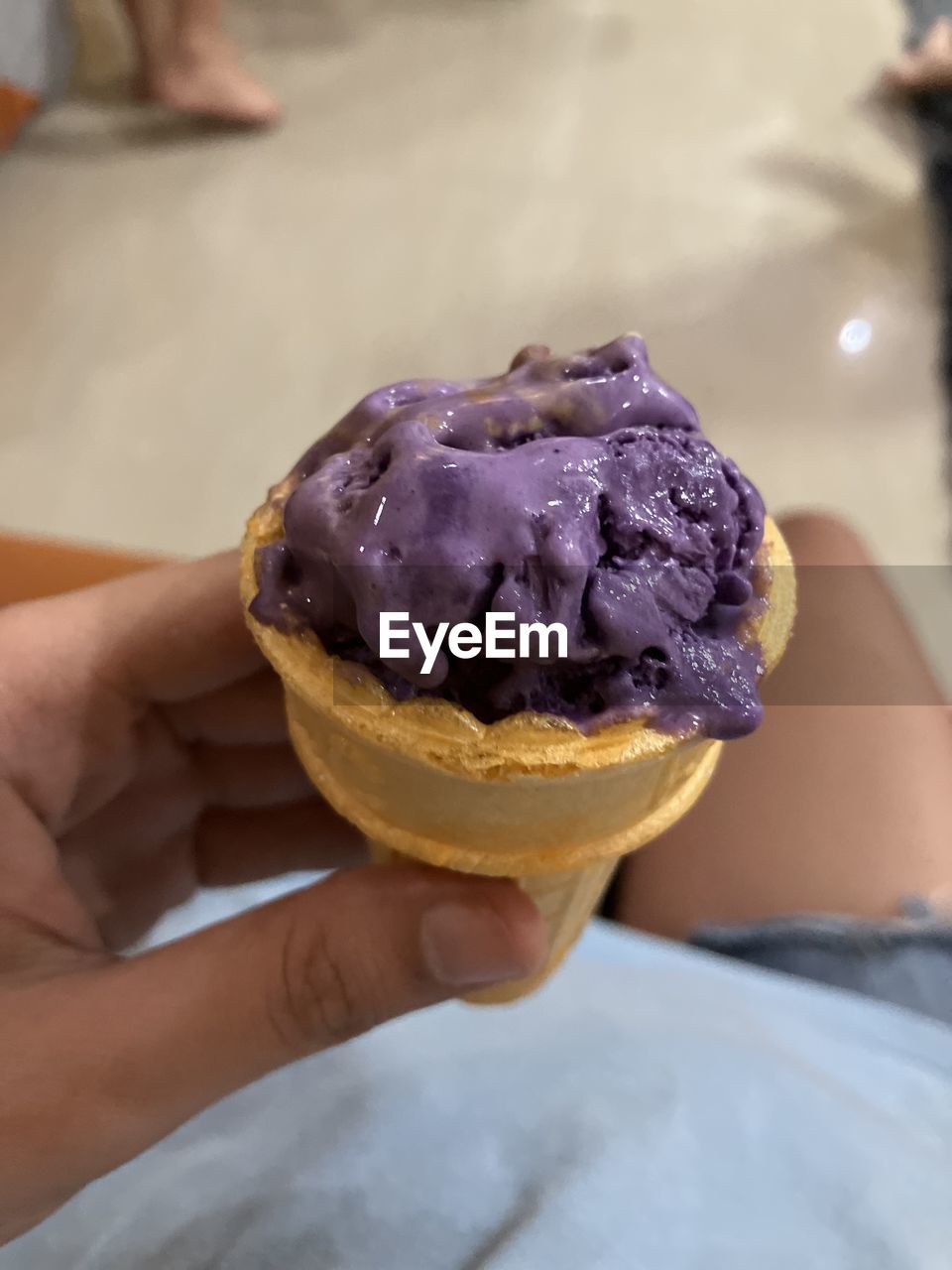 food, food and drink, sweet food, sweet, frozen food, ice cream, frozen, hand, dessert, cone, ice cream cone, sweetness, dairy, holding, unhealthy eating, one person, temptation, freshness, fast food, icing, adult, baked, women, close-up, focus on foreground, gelato, summer, vanilla ice cream, vanilla, day, cold temperature