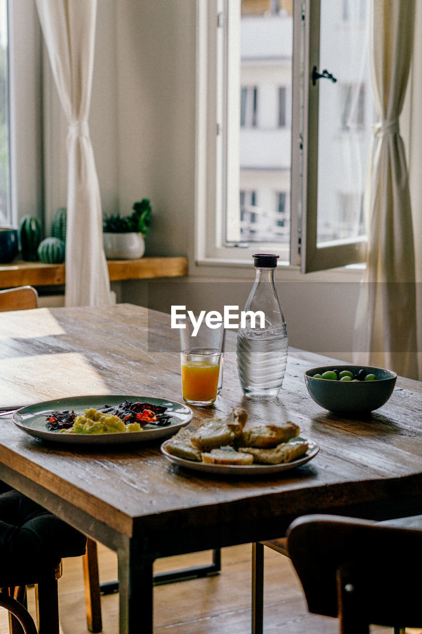 High angle view of breakfast served on table at home