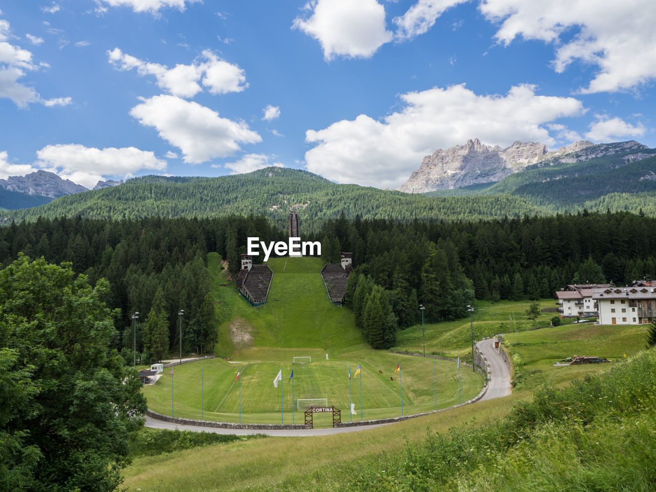 SCENIC VIEW OF GREEN LANDSCAPE AGAINST SKY