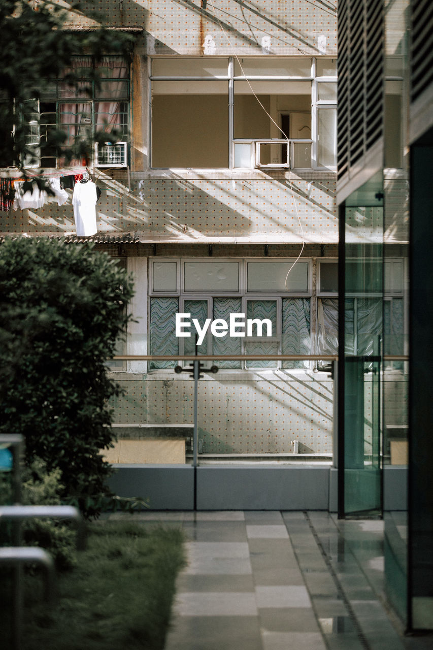 BUILDINGS SEEN THROUGH WINDOW