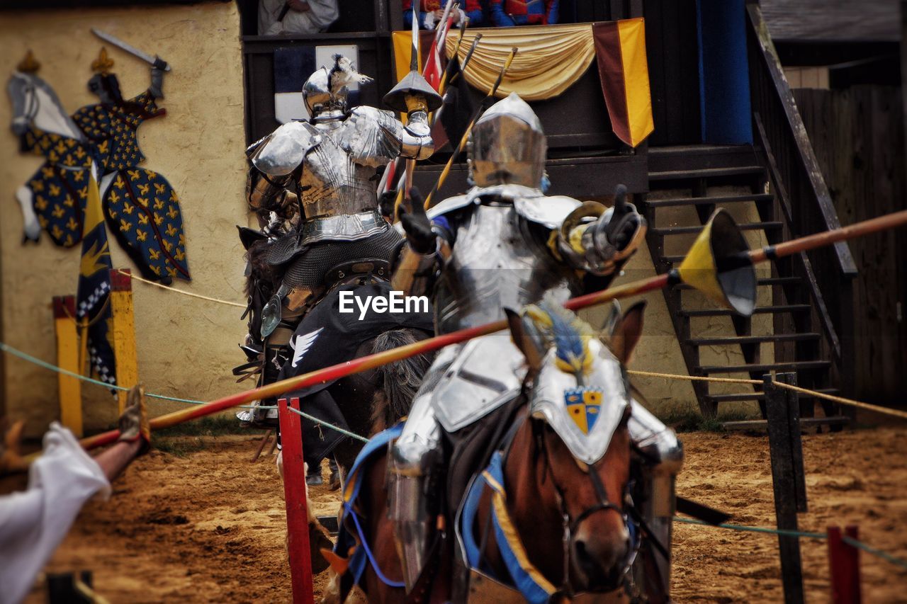 Knights in armor riding horses