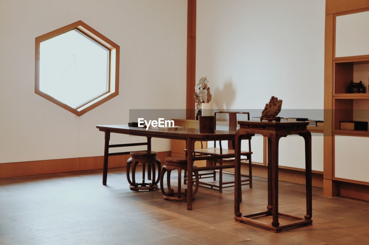 Chairs and tables on hardwood floor at home