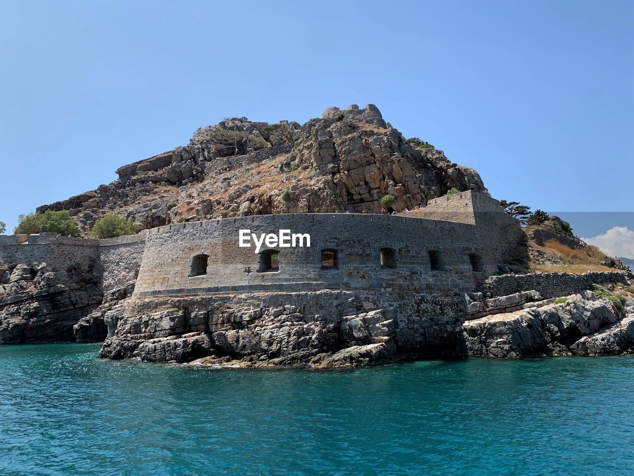 View of sea against clear blue sky