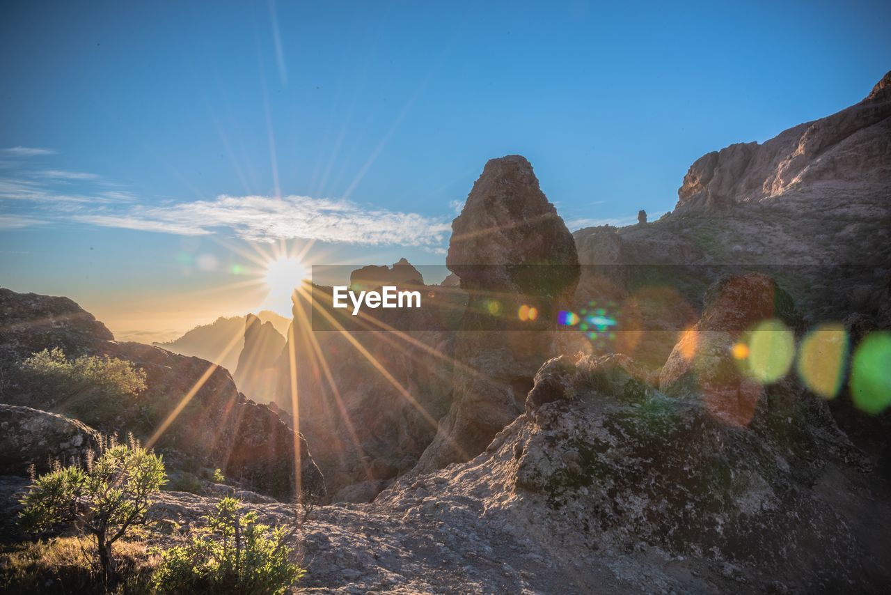 Scenic view of rocky mountains against sky