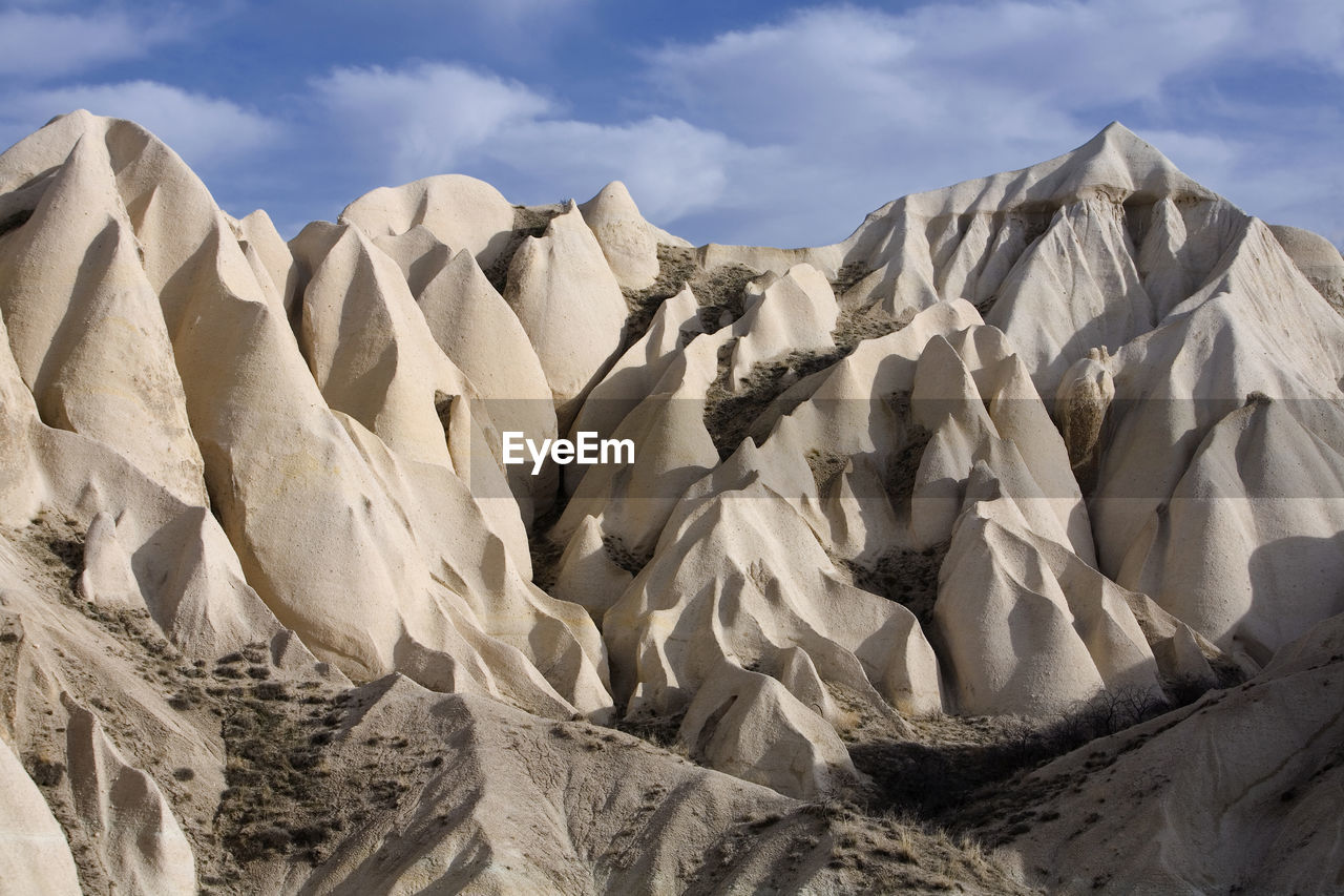 Panoramic view of desert against sky