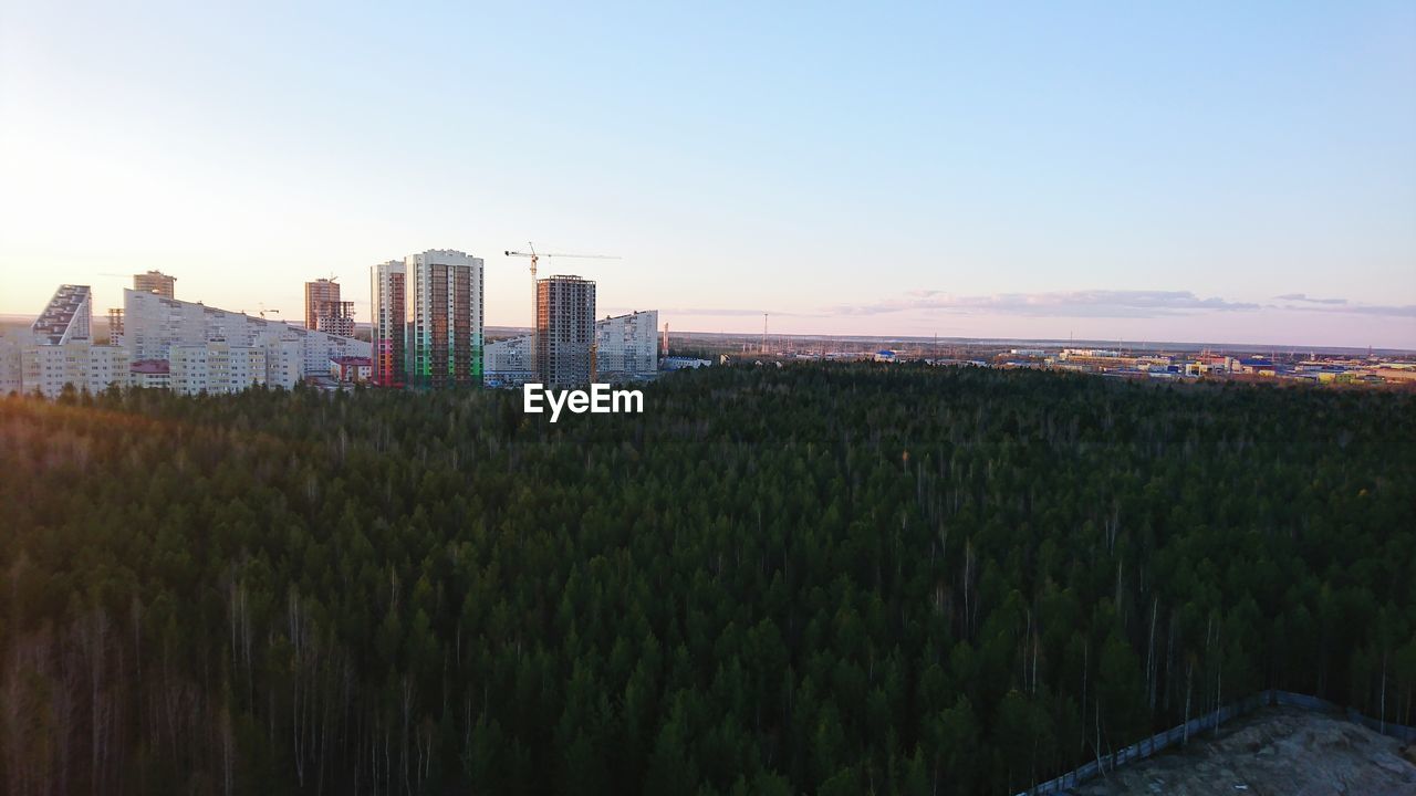 Panoramic view of cityscape against clear sky